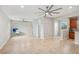 Bright and airy living room with hardwood floors and ceiling fan at 3978 Jacob Lake Cir, Las Vegas, NV 89118