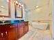 Spa-like bathroom with double vanity and a large soaking tub at 4525 Dean Martin Dr # 501, Las Vegas, NV 89103