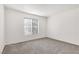 Bright and airy bedroom with large window and carpet flooring at 5000 Red Rock St # 217, Las Vegas, NV 89118