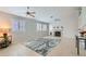 Living room with fireplace, tile floors and ceiling fans at 5204 Brookmere Dr, Las Vegas, NV 89130