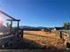 Empty lot with wooden fence and mountain backdrop at 6249 W Gowan Rd, Las Vegas, NV 89108