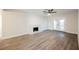 Living room with fireplace and French doors leading to the backyard at 6750 Laronda Ln, Las Vegas, NV 89156