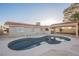 Kidney-shaped pool with surrounding patio area at 6750 Laronda Ln, Las Vegas, NV 89156