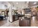 Spacious kitchen with ample counter space and island seating at 1004 Crest View Dr, Mesquite, NV 89027