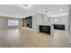 Bright living room with hardwood floors, a fireplace, and an open floor plan at 106 Manganese St, Henderson, NV 89015