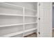 Ample storage with a large, white, built-in shelving unit at 113 Fiery Hill Ave, Henderson, NV 89011