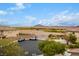 Aerial view of a cul-de-sac with houses and mountain views at 1172 Via Della Costrella, Henderson, NV 89011