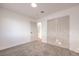 Spacious bedroom with double door closet and carpet at 428 Rossmoyne Ave, North Las Vegas, NV 89030