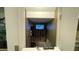 Finished basement area with a mounted TV at 4421 Outlook Vista Ave, North Las Vegas, NV 89084