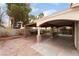 Covered patio, brick pavers, and a relaxing hammock at 5220 Jose Ernesto St, North Las Vegas, NV 89031