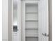 Open pantry with four shelves for storage at 5260 River Glen Dr # 261, Las Vegas, NV 89103