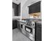 Kitchen detail with stainless steel range and hood at 5678 Robin Ridge Ave, Las Vegas, NV 89141