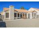 Large backyard with patio, covered area and gravel at 6020 Theatrical Rd, North Las Vegas, NV 89031