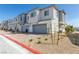 Modern two-story home with attached garage and landscaping at 6176 Foxes Dale St, Las Vegas, NV 89166