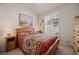 Bedroom with wooden bed frame and southwestern decor at 715 Aztec Cir, Mesquite, NV 89027