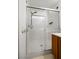 Large walk-in shower with glass enclosure and modern fixtures at 7454 Pember St, Las Vegas, NV 89143