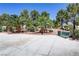 Landscaped community area with benches at 7649 Velvet Mist St, Las Vegas, NV 89131