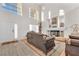 Bright living room with hardwood floors and fireplace at 7854 Spindrift Cove St, Las Vegas, NV 89139