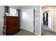 Bedroom with double-door closet and dresser at 909 Riverlawn Pl, Las Vegas, NV 89138