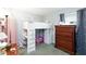 Charming bedroom with loft bed and dresser at 909 Riverlawn Pl, Las Vegas, NV 89138