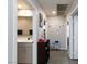 Bright hallway with access to bathroom and bedrooms at 909 Riverlawn Pl, Las Vegas, NV 89138