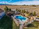 Aerial view of a home with a pool and fenced backyard at 9350 Homestead Rd, Las Vegas, NV 89143