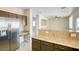 Spacious kitchen featuring granite counters and breakfast bar at 9675 Flying Eagle Ln, Las Vegas, NV 89123