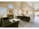 Living room features a fireplace and ample natural light at 9675 Flying Eagle Ln, Las Vegas, NV 89123