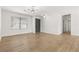 Light and airy living room with neutral walls and wood-look flooring at 110 Palo Verde Dr, Henderson, NV 89015