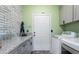 Bright laundry room with washer, dryer, and ample counter space at 2253 Van Gogh Dr, Henderson, NV 89074