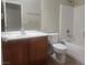 Clean bathroom with shower/tub combo, toilet and wood vanity at 2652 Rue Marquette Ave, Henderson, NV 89044