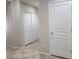 Bright hallway with tile flooring and neutral walls at 2652 Rue Marquette Ave, Henderson, NV 89044