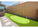 Putting green and block wall in backyard at 2661 Skylark Trail St, Henderson, NV 89044