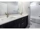 Modern bathroom with double vanity and a large bathtub at 2661 Skylark Trail St, Henderson, NV 89044