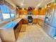 Kitchen with stainless steel appliances and light beige countertops at 2710 Mustang Pass St, Laughlin, NV 89029