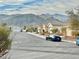 Residential street with mountain views and nearby homes at 2710 Mustang Pass St, Laughlin, NV 89029