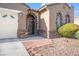 Front entry with wrought iron gate and stone accents at 3611 Winter Wren St, Las Vegas, NV 89122