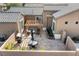 Flagstone patio with pergola, seating area and grill at 3611 Winter Wren St, Las Vegas, NV 89122