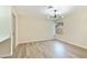 Open dining area with light walls and wood-look flooring at 3875 Redwood St, Las Vegas, NV 89103