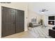 Virtually staged entryway with view into living room at 3875 Redwood St, Las Vegas, NV 89103