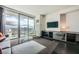 Living room with floor-to-ceiling windows and city views at 4381 W Flamingo Rd # 5220, Las Vegas, NV 89103