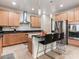 Spacious kitchen with stainless steel appliances and an island at 4646 Roger River Ave, Las Vegas, NV 89141