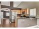 Kitchen with stainless steel appliances and light wood cabinets at 5217 Yellow Dawn Ct, Las Vegas, NV 89130