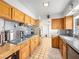 Kitchen boasts wood cabinets, gas cooktop and ample counter space at 556 Canosa, Las Vegas, NV 89104