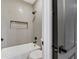 Modern bathroom with shower and grey tile at 62 Incline Village Ct, Henderson, NV 89074