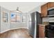 Bright dining area with wood flooring and a view at 733 Rock Springs Dr # 201, Las Vegas, NV 89128