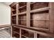 Butlers pantry with extensive built-in shelving and wine cooler at 9103 Alta Dr # 1101, Las Vegas, NV 89145