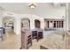 Custom wet bar with wine storage and granite countertop at 9103 Alta Dr # 1101, Las Vegas, NV 89145