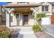 Front entrance with stairs leading to a covered porch at 954 Ashford Hollow Ave, Henderson, NV 89012