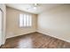 Bright bedroom with wood-look floors and plantation shutters at 11368 Rancho Portena Ave, Las Vegas, NV 89138